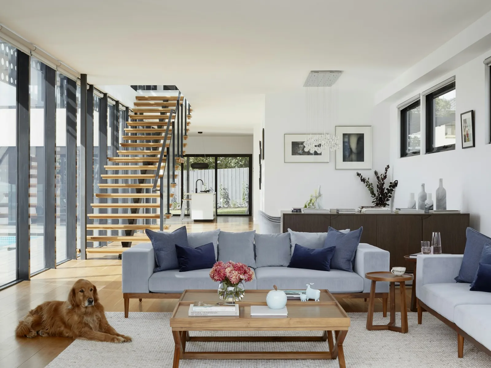 Warm interior with a stair and open shelving